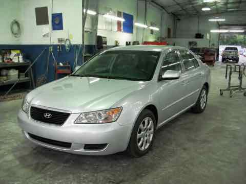 Silver Hyundai sedan fully repaired and photographed from a different angle
