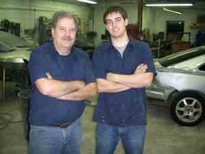 Fictional father-and-son owners Ray and Evan in their repair shop in 2008